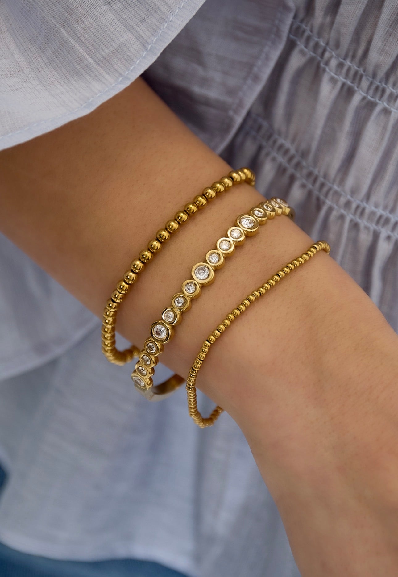 Bangle armband met ronde steentjes