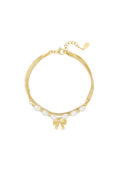 Armband parels en strik Goudkleur 