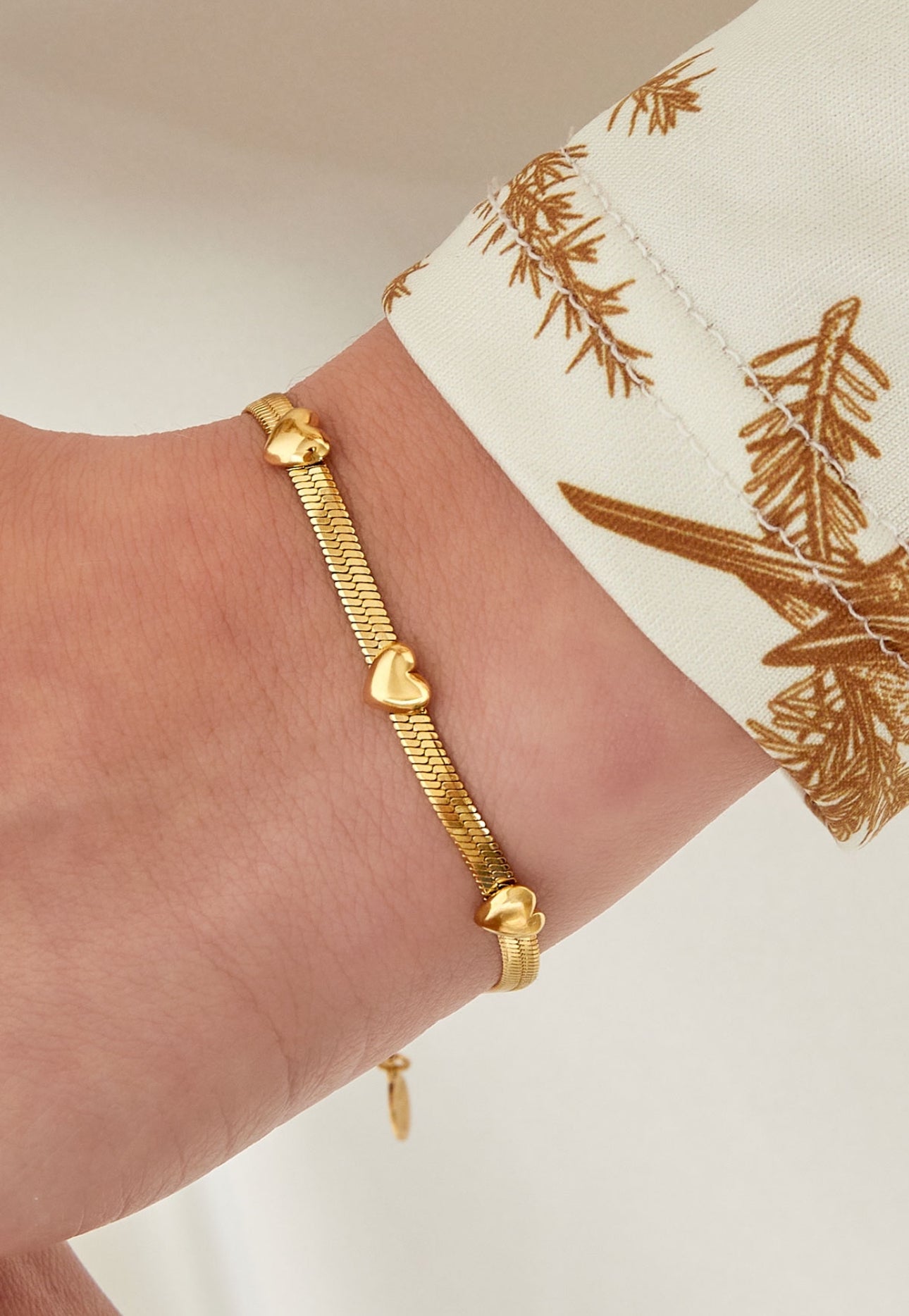 Armband snake chain met 3 hartjes