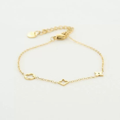 Minimalistische armband goudkleurig met figuurtjes 