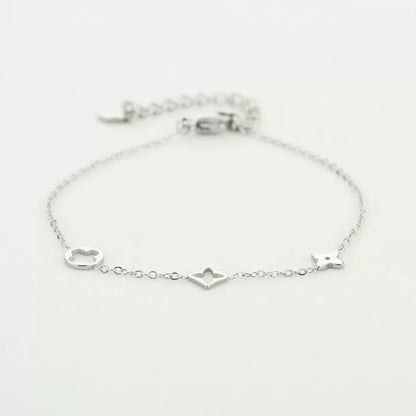 Minimalistische armband zilverkleurig met figuurtjes 