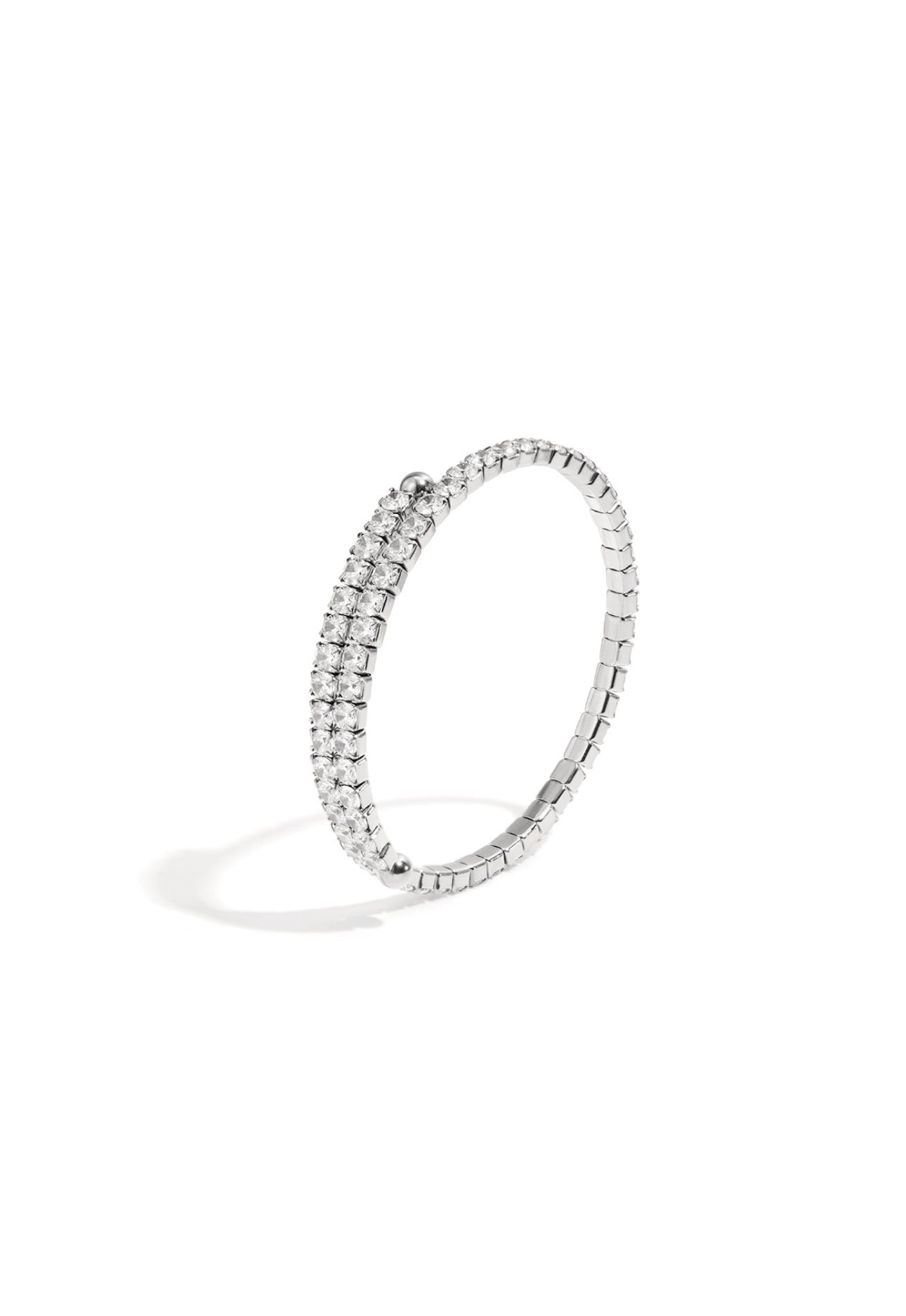Zilverkleurige bangle/armband met strass steentjes 