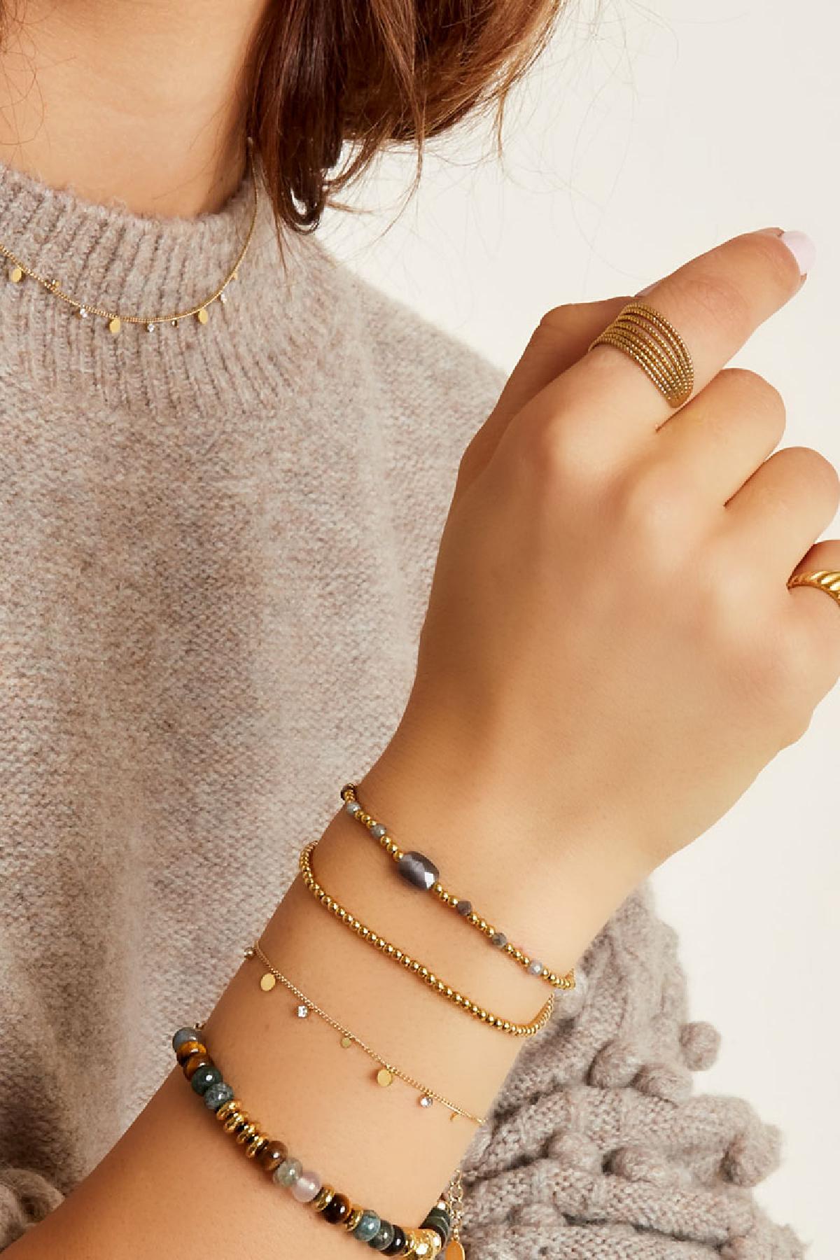Minimalistische armband met rondjes en strass steentjes waterproof 