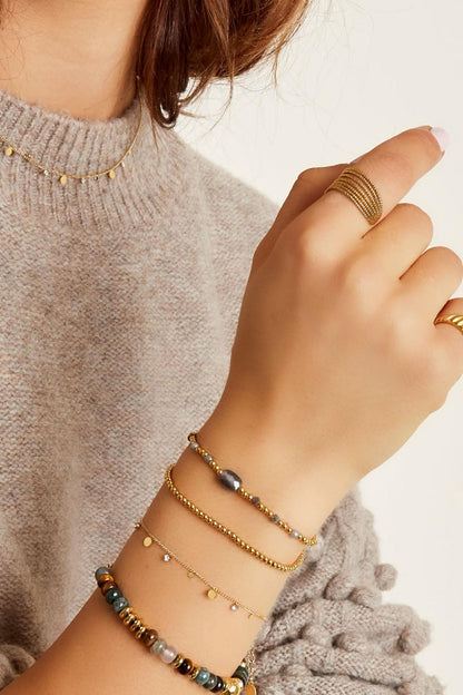 Minimalistische armband met rondjes en strass steentjes waterproof 